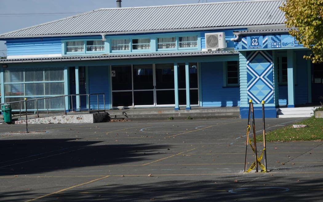 The school's permanent campus lies empty for now.