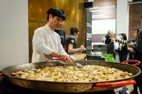 John Allred making Paella, City Art Gallery, Wellington