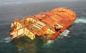 Salvage efforts are continuing on the Rena's bow wedged on Astrolabe Reef.