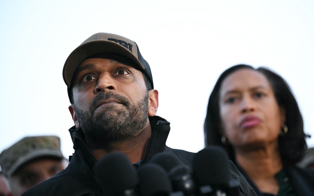 FBI Director Kash Patel (L) and District of Columbia mayor Muriel Bowser attend a press conference after a shooting in downtown Washington, on November 26, 2025. On November 26, FBI Director Kash Patel told reporters two National Guard troops shot blocks away from the White House in downtown Washington were critically wounded, clarifying earlier erroneous reports that they had died. (Photo by Drew ANGERER / AFP)