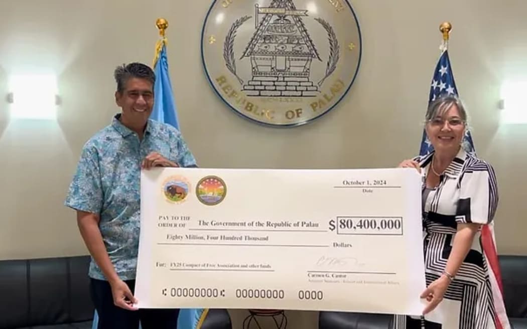 Palau received the US$80.4 million allotted for fiscal year (FY) 2025 under the renewed economic provisions of COFA on its 30th anniversary of independence on 1 October. On the left is Palau's President Surangel Whipps Jnr and on the right is US assistant secretary for Insular and International Affairs, Carmen Cantor.