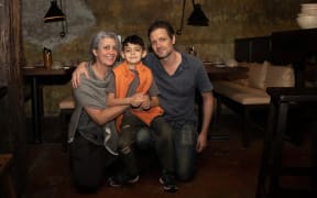 Krishna Botica, Tony McGeorge and their son at their restaurant, Ghost St.