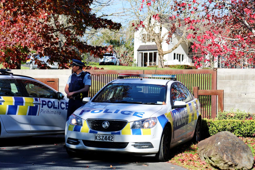 Police at the Coatesville property where two people were found deceased after a fire.
