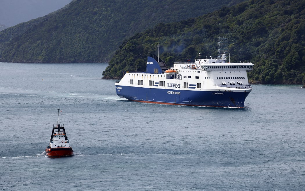 Bluebridge ferry the Connemara berthing at Picton wharf, helped by a tug, after earlier hitting the wharf while attempting to berth.