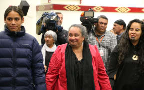 Glenis Philip-Barbara (centre) and Julia Whaipooti from the Office of the Children's Commission (right).