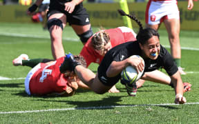 Black Fern Sylvia Brunt scores a try.