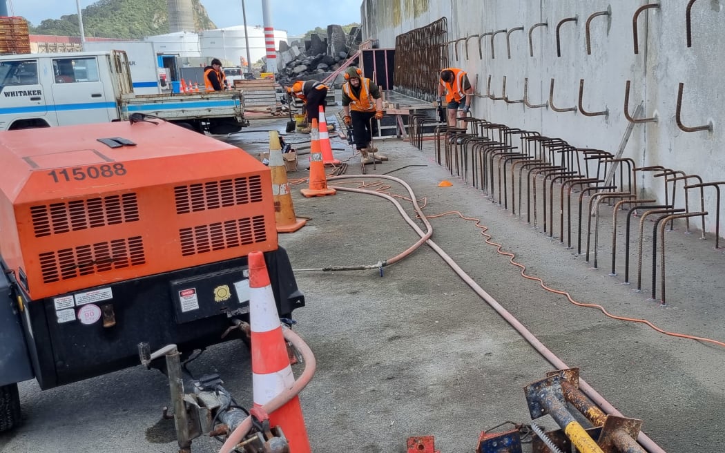 Steel rods are in place for the concrete footing and the tapered concrete reinforcing wall on the 1994 section of the Main Breakwater wave wall.