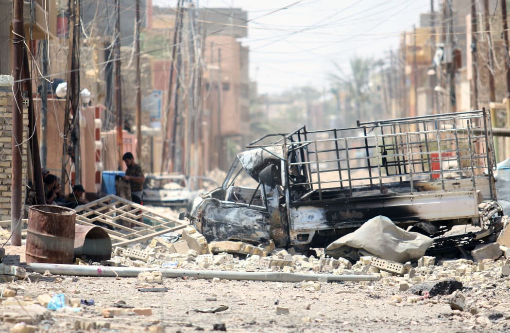 Destruction is seen in Fallujah, 50 kilometres (30 miles) from the Iraqi capital Baghdad, after Iraqi forces retook the embattled city from the Islamic State group on June 26, 2016. I