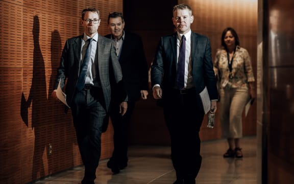 Dr Ashley Bloomfield and Chris Hipkins on their way to media briefing on Covid-19