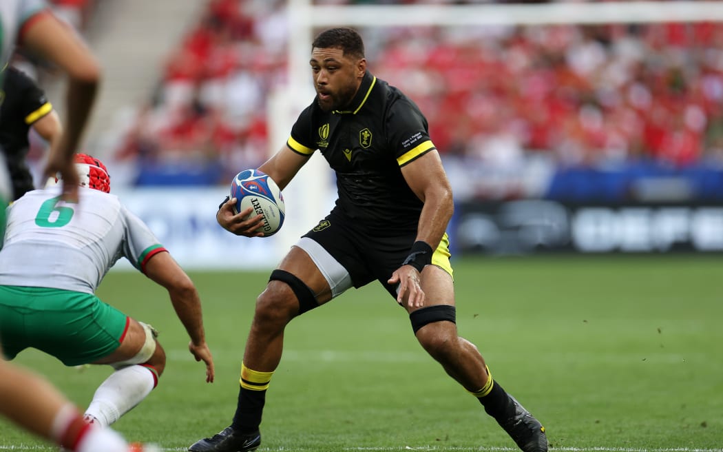 Taulupe Faletau of Wales on the charge against Portugal.