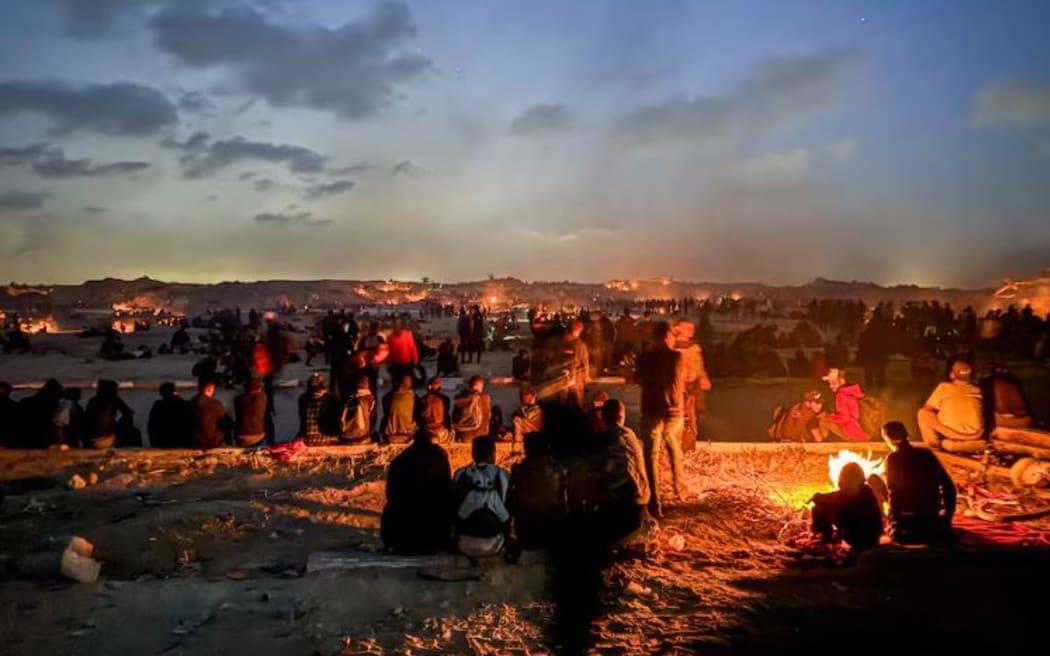 Gangs waiting to loot aid trucks at the Netzarim Corridor in central Gaza.