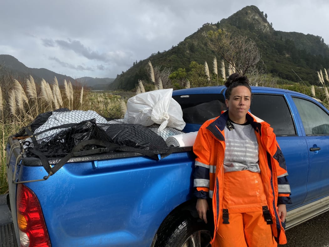 Te Araroa woman Ripeka Irwin and other concerned locals had by Wednesday collected five ute-loads of waste washed out of the old Te Araroa dump.