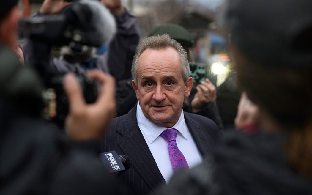 Thomas Dickey, attorney for suspected shooter Luigi Mangione speaks to reporters in front of the Blair County Courthouse after an extradition hearing Tuesday in Hollidaysburg, Pennsylvania.