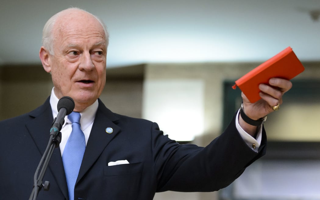 UN envoy for Syria Staffan de Mistura gestures as he speaks after a session of Syrian peace talks with the Syrian government delegation at the United Nations (UN) Offices in Geneva on January 29, 2016.