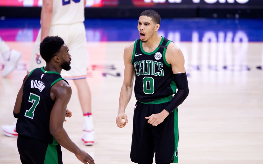 Boston Celtics Forward Jayson Tatum (0) celebrates with Forward Jaylen Brown (7)