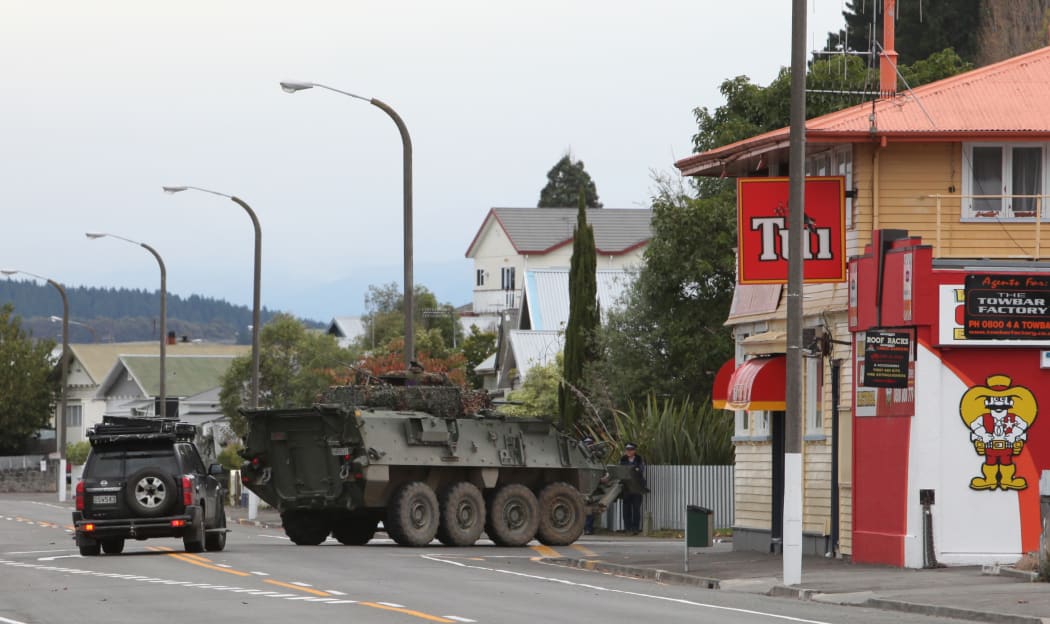 A Defence Force LAV (light armoured vehicle) heads up Chaucer Road during the Napier Siege.