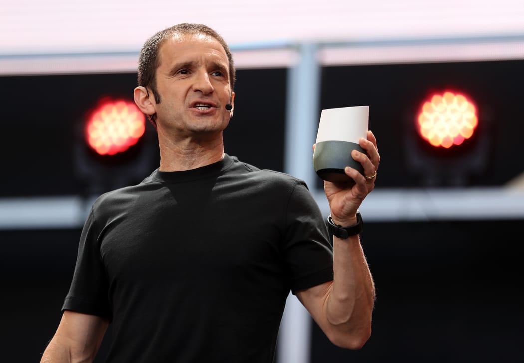 Google vice president of product management Mario Queiroz with a Google Home Device.