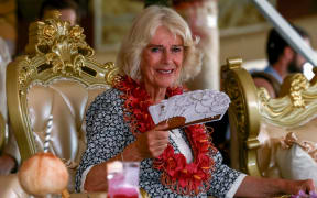 Britain's Queen Camilla attends the bestowing and farewell ceremony on the final day of the royal visit to Samoa at the Siumu Village in Apia on October 26, 2024.