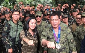 Pop star Mocha Uson is a social media staffer for the President of the Philippines Rodrigo Duterte.