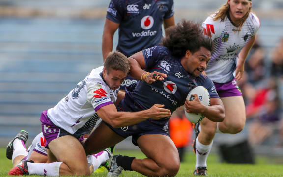 Warriors prop Bunty Afoa with possession against Melbourne Storm in Rotorua