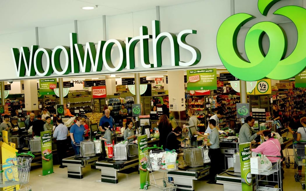 People shop at a Woolworths supermarket in Sydney.