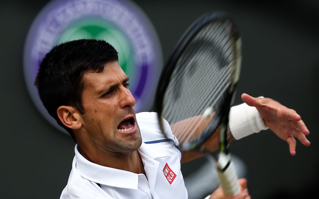 Defending champion Novak Djokovic is through the semi-finals.