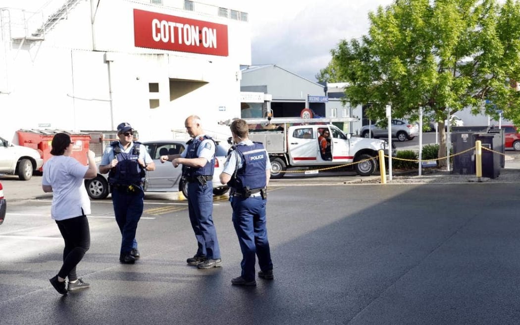 Police officers arrive at the scene to initally clear members of the public from the area.