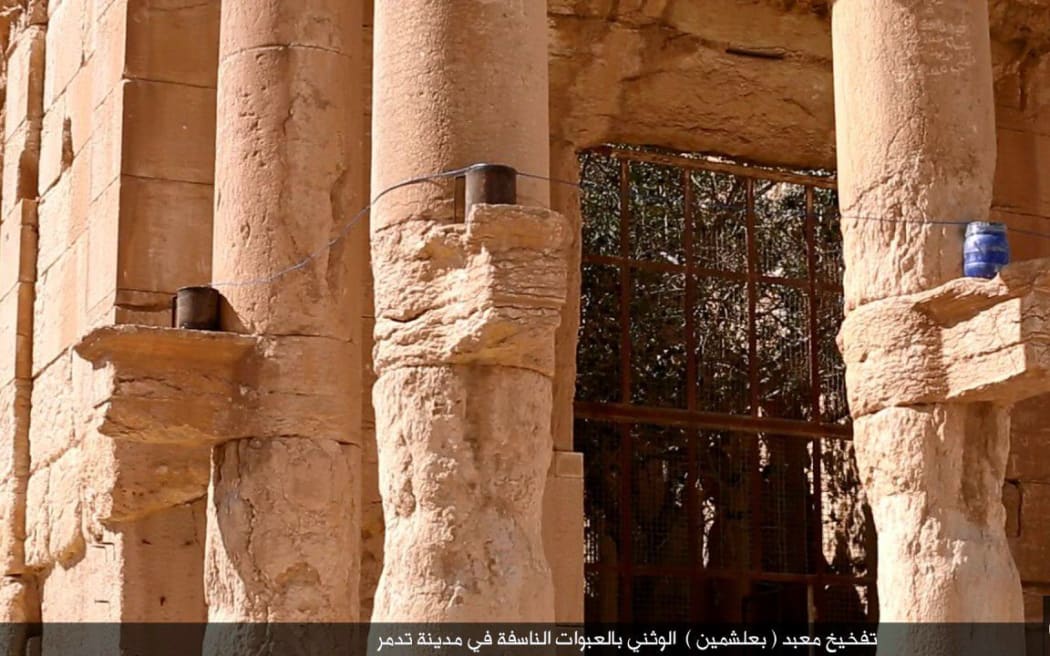 Islamic State has published images of the destruction of the Temple of Baalshamin at the ancient ruins of Palmyra in Syria.