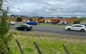 Emergency services at the scene of a horror crash on Auckland's State Highway 1 near Ramarama on 26 August 2024.