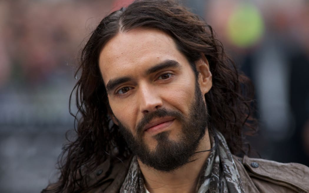 British actor Russell Brand arrives for the European premiere of the film 'Rock of Ages' at the Odeon Cinema in Leicester Square in London, on 10 June, 2012. London police have questioned the comedian and actor over allegations of three sexual offences, 'The Times' reported on 19 November, 2023, following claims from several women of rape, sexual assault and emotional abuse. Brand, 48, has denied the claims stemming from an investigation by 'The Times', 'The Sunday Times' and Channel 4 of the alleged incidents, which are said to have taken place between 2006 and 2013.