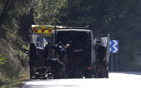 Bomb squad police at the site where Moroccan suspect Younes Abouyaaqoub was shot on 21 August 2017.