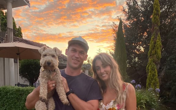 Robbie Macgregor and Caitlin Nugent with Robbie's family dog, Milly