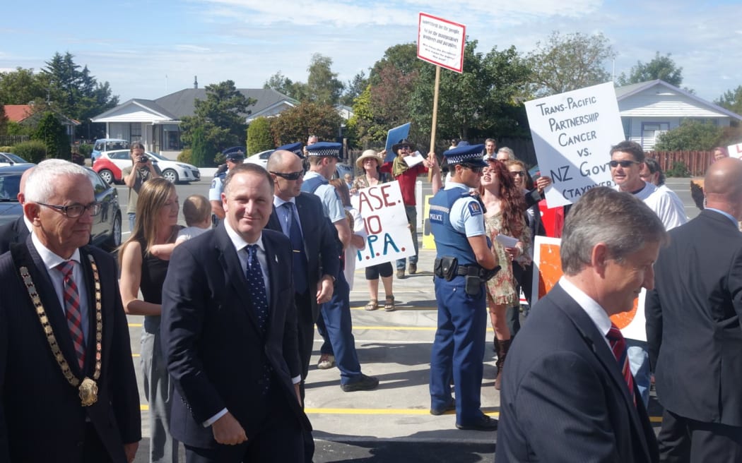 About a dozen protesters were at the opening of the Oxford Town hall , which John Key opened today.