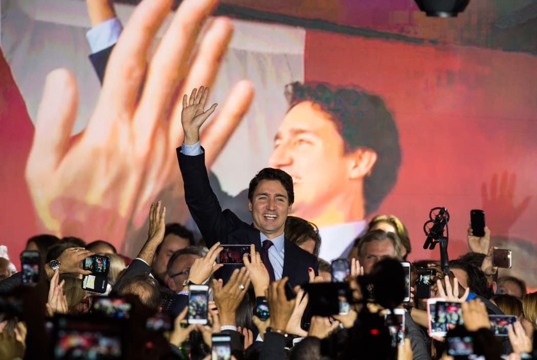 Canadian Liberal Party leader Justin Trudeau arrives on stage in Montreal on October 20, 2015 after winning the general elections.