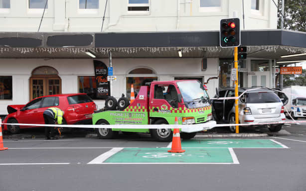 Car smashes into central Auckland building, causes extensive damage | RNZ