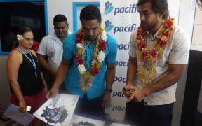 Blues loose forwards Jerome Kaino and Steven Luatua at a signing session in Samoa.