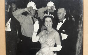 Queen Elizabeth II and Constable Graham John Taylor (policeman on the left) following the incident that caused him "eternal embarrassment".