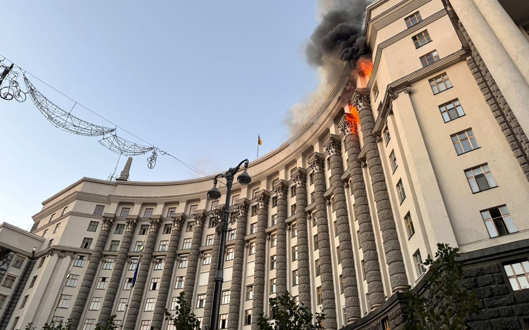 This handout photograph taken and released by Ukrainian State Emergency Service on September 7, 2025, shows a fire at the Ukrainian government building in Kyiv, following an overnight attack, amid the Russian invasion of Ukraine. Russia fired its biggest-ever aerial barrage at Ukraine early on September 7, setting the seat of the Ukrainian government in Kyiv ablaze, authorities said. (Photo by Handout / Ukrainian State Emergency Service / AFP) / RESTRICTED TO EDITORIAL USE - MANDATORY CREDIT "AFP PHOTO /  UKRAINIAN STATE EMERGENCY SERVICE " - HANDOUT - NO MARKETING NO ADVERTISING CAMPAIGNS - DISTRIBUTED AS A SERVICE TO CLIENTS