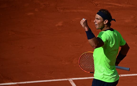 Spain's Rafael Nadal reacts as he plays against Argentina's Diego Schwartzman during their men's singles quarter-final tennis match on Day 11 of The Roland Garros 2021 French Open tennis tournament in Paris on June 9, 2021.