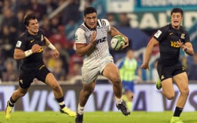 Crusaders hooker Codie Taylor makes a break against the Jaguares in Buenos Aires.
