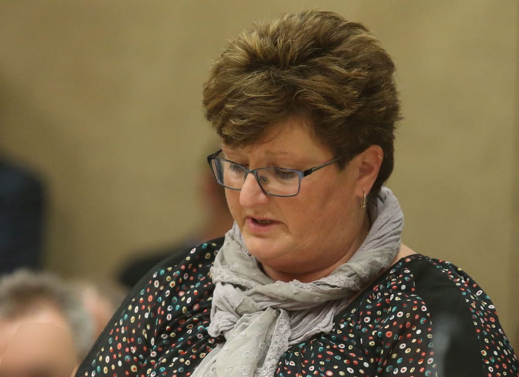 Work and Income employee Leigh-Anne Hydes  reads her victim impact statement.