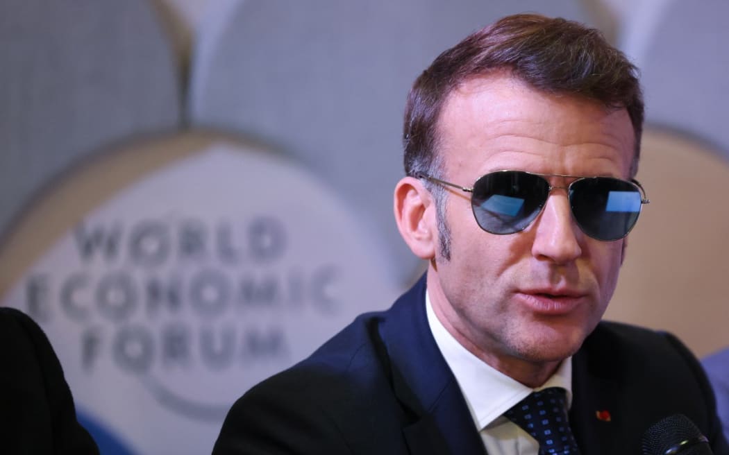 France's President Emmanuel Macron delivers remarks during a meeting with leaders of AI companies during the World Economic Forum (WEF) annual meeting in Davos on 20 January, 2026.