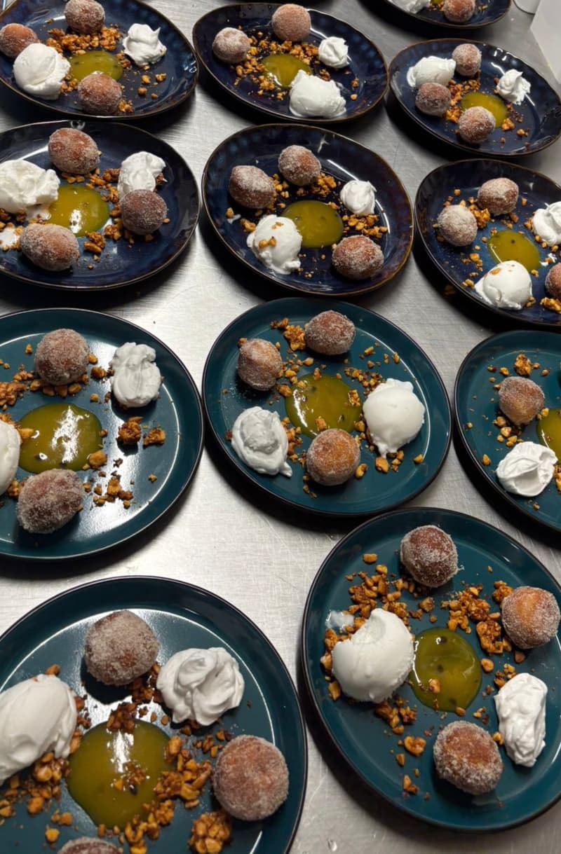 Gluten-Free Mandazi with Mango–Passionfruit Curd, Cashew Chilli Crumble & Whipped Coconut Cream.