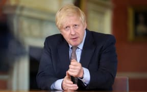 Britain's Prime Minister Boris Johnson being filmed giving his address to the nation inside 10 Downing Street in London on May 9, 2020.