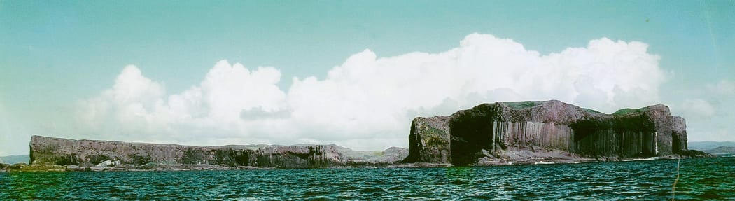 The Isle of Staffa, with its Fingal's Cave to the right - inspiration for Mendelssohn's Hebrides Overture.