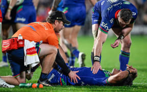 Jacob Laban of the Warriors receives medical attention, NZ Warriors v Dolphins.