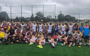 Niue celebrate topping Pool A after beating the Philippines.