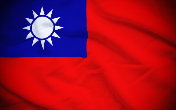 Wavy and rippled national flag of Taiwan background.