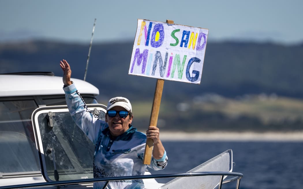 A flotilla of more than 50 watercraft converged from Whangārei Heads to Langs Beach to oppose the proposal to dredge nearly 8.5 million cubic meters of sand over the next 35 years.