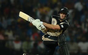New Zealand's Mitchell Santner plays a shot during the World T20 match between India and New Zealand in Nagpur on 15 March 2016.
